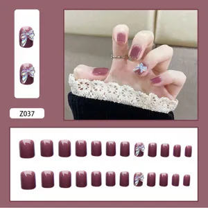 Faux ongles rouge vin avec nœuds papillon irisés, ensemble de 24 pièces détail