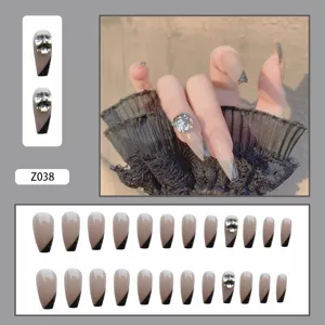 Élégants ongles press-on de style français 24 pièces avec strass papillon et bouts noirs