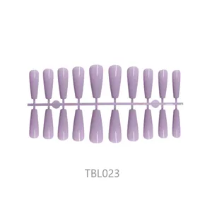 High-quality solid lavender long ballerina press-on nails set on plastic sprue frame