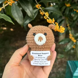 Handcrafted crochet emotional support bear doll with encouraging card, cute plush gift.