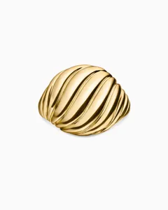 Detail view of an 18K gold pleated croissant ring with a twisted grooved texture.