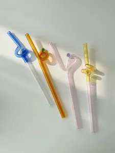 Aesthetic colorful glass twisted straw for coffee and drinks, cute reusable design.