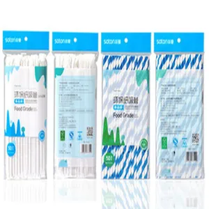 Eco-friendly disposable paper straws in blue stripes and plain white four packs detail view