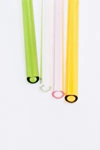 Colorful glass drinking straw set, clear heat-resistant straw detail view for drinks.