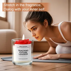 Scented soy wax candle with rose design in glass jar for home fragrance and relaxation decor