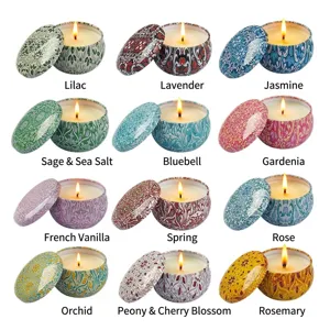 12-piece scented candle set in colorful patterned tins with various floral scents
