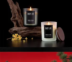 Scented soy wax candles in glass jars with wooden lids. Perfect home decor and gifts.