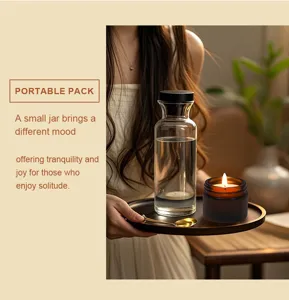 Scented soy wax candle in amber glass jar for cozy home decor and relaxing ambiance detail.