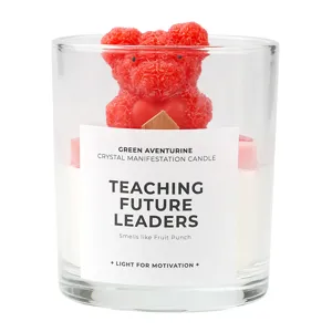 Scented soy candle in glass jar with cute red bear wax figure, perfect gift and home decor.