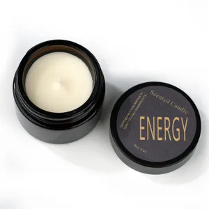 Scented soy wax candle in amber glass jar with black lid, perfect home fragrance and decor gift.