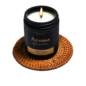 Scented soy wax candle in black jar for home fragrance and relaxation, long-lasting aroma gift.