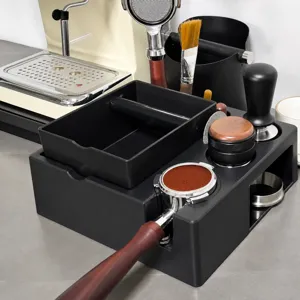 Stazione di pressatura caffè e battefondo organizer per accessori macchina espresso.