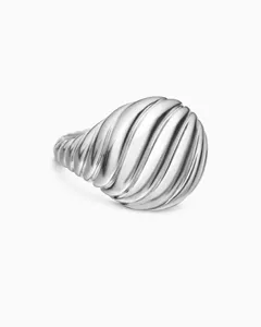 Macro view of a silver twisted ribbed ring showing elegant spiral texture