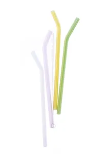 Detailed view of colorful bent glass drinking straws with a cleaning brush, eco-friendly.