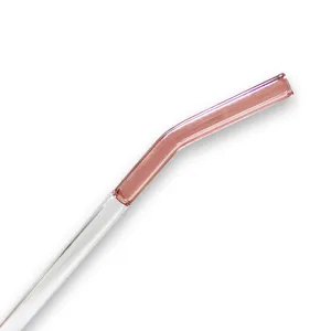 Detailed close up view of the pink and clear lip shaped borosilicate glass straw item