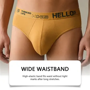 Herren senfgelbe Mitteltaille Slips mit elastischem Bund und atmungsaktivem weichem Stoff.