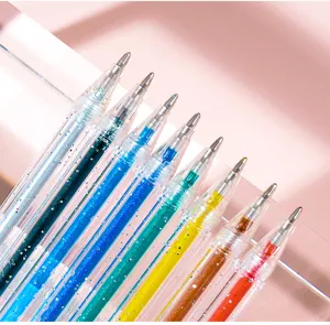 Close-up view of colorful glitter gel pens on clear acrylic stand with sparkling ink details.