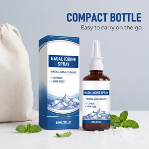 Spray nasal à l'iode minéral 60 ml avec boîte et décor de menthe fraîche.