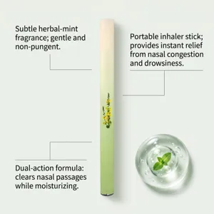 Detail of portable herbal inhaler stick showing natural mint ingredients and benefits