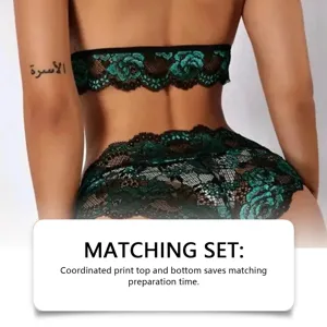 Detailed macro view of the green floral lace back on this sexy two-piece lingerie set