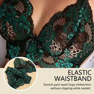 Close-up detail of sexy two-tone green lace lingerie set with elastic waistband