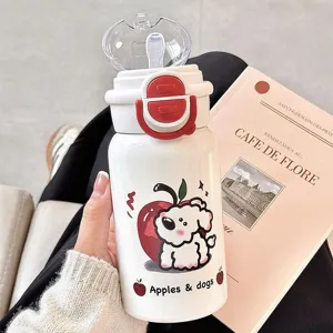 Detailed view of white insulated water bottle with cute cartoon dog and straw lid