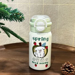 Borraccia termica per bambini con un grazioso motivo a cartone animato di cane e fragola