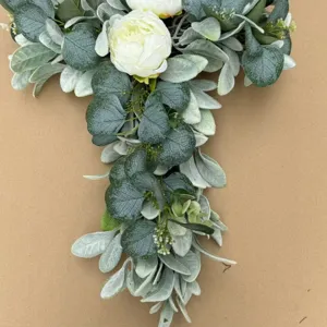 Elegant artificial white peony and eucalyptus teardrop swag for door decor