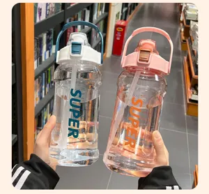 Detail of two 2L high-capacity sports water bottles with 'SUPER' logo and scale