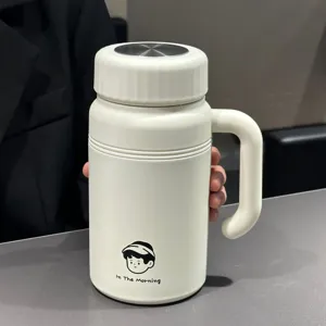 Bouteille isotherme en acier inoxydable blanc avec poignée et joli imprimé pour voyage.