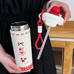 Insulated stainless steel straw tumbler with cute rabbit design, portable rope and lid.