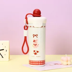 Bouteille isotherme en acier inoxydable lapin mignon avec sangle en silicone pour étudiants.