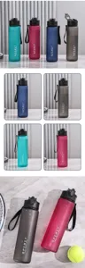 Detailed view of 750ml frosted sports water bottle with flip-top lid and portable strap.