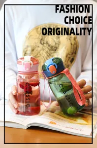 Detail view of transparent plastic water bottle with strap and fruit infusion design.