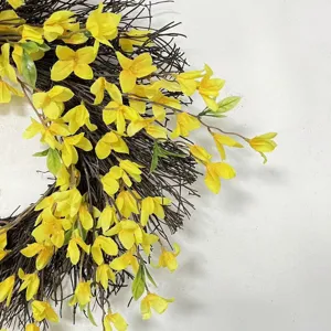 Detailed macro view of vibrant yellow forsythia petals on a natural twig wreath base