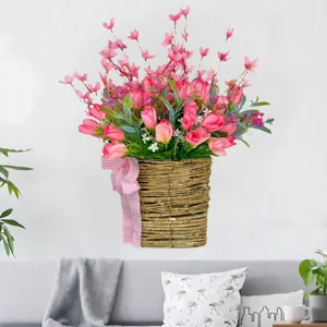 Close-up of pink artificial tulip flower basket with checkered ribbon for home wall decor