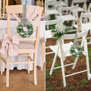 Detail showing artificial eucalyptus wreaths with plaid bows decorating wedding chairs