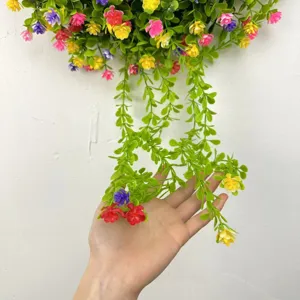 Detailed view of artificial eucalyptus hanging plant featuring vibrant multi-colored flowers