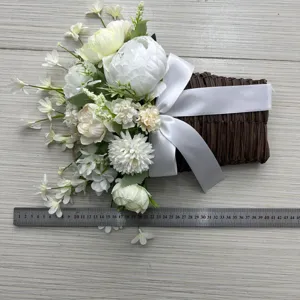 White peony and narcissus artificial flower basket shown with ruler for size reference