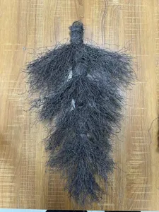 Close-up view of a dark grey teardrop plastic broom wreath base for DIY holiday decor
