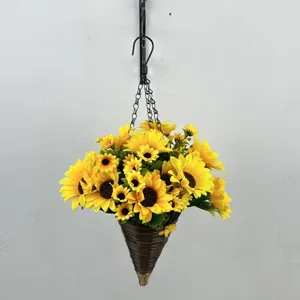 Artificial sunflower floral arrangement in a brown cone-shaped woven hanging basket