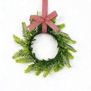Decorative artificial Persian leaf wreath featuring a classic red and white checkered bow.