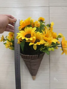 Measurement detail showing the height of artificial sunflower wall basket with a ruler