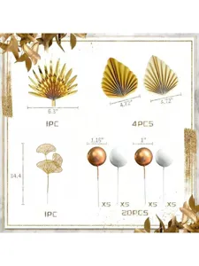 Champagne gold cake decoration set featuring palm leaves, ginkgo branches, and decorative balls.