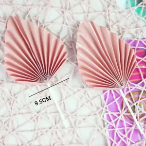 Pink folding fan cake toppers, peach shaped paper fan dessert table party decoration.