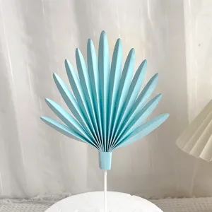 Blue paper fan cake topper leaf decoration for birthday party baking and sweet dessert.