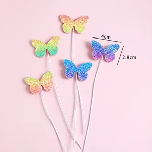 Set of five colorful glitter butterfly cake toppers for birthday party cake decoration