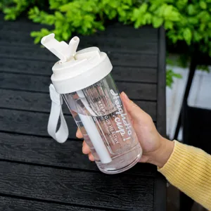 Large capacity 600ml plastic water bottle with straw and tea infuser for outdoor portable use.