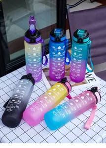 Detailed view of colorful gradient sport water bottle with time marker and convenient strap.