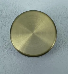 Replacement stainless steel water bottle lid, durable brushed metal texture cap for sports flask.